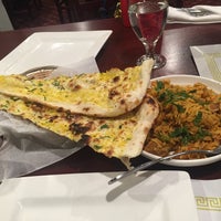 Photo taken at Om Indian Cuisine by Olga A. on 5/21/2018