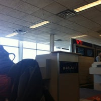 Photo taken at Gate F13 by Leah M. on 11/13/2012