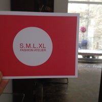 Photo taken at S.M.L.XL fashion atelier by Olga B. on 7/1/2014