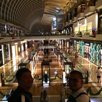 Photo taken at The Shoppes at Marina Bay Sands by TjPundinKhayr L. on 12/8/2014