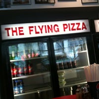 Photo taken at The Flying Pizza by Mark J. on 4/25/2013