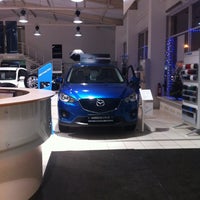 Photo taken at Mazda Cosmo Motors by Aliya A. on 12/8/2012