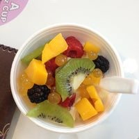 Photo taken at SweetFrog Frozen Yogurt by Lauren F. on 9/27/2012