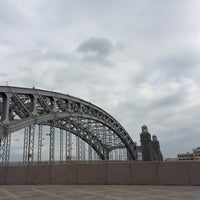 Photo taken at Bolsheokhtinsky Bridge (Peter the Great Bridge) by Мария М. on 6/26/2016
