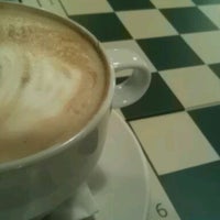 Photo taken at Cafe Milo by Ben T. on 12/14/2011