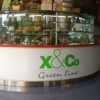 Photo taken at X&amp;amp;Co green line by Vitaly C. on 6/22/2012