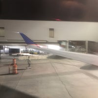 Photo taken at Gate 80 by Alex L. on 8/17/2017