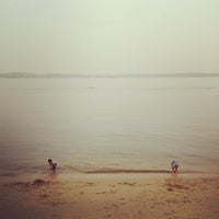 Photo taken at Sembawang Beach by Dominic T. on 10/6/2012