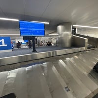 Photo taken at Baggage Claim - T4 by Victoria M. on 12/5/2021