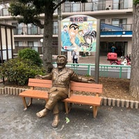 Photo taken at ひとやすみ両さん像 by 此嶋ゆう on 4/27/2019