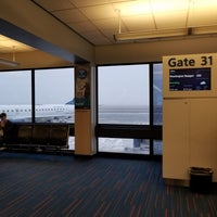 Photo taken at Gate C31 by Phi D. on 1/15/2018