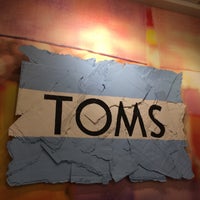 Photo taken at TOMS STORE TOKYO by Shimma A. on 12/26/2017