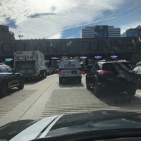 Photo taken at Holland Tunnel Toll Plaza by Tara D. on 6/19/2018