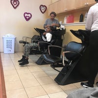 Photo taken at Magic Dominican Hair Salon by Tara D. on 1/6/2018