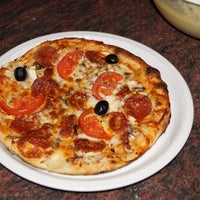 รูปภาพถ่ายที่ Pizzeria Aroma โดย Aroma pizzeria เมื่อ 5/12/2013