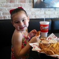 Photo taken at Raising Cane&#39;s Chicken Fingers by Katie M. on 10/29/2014