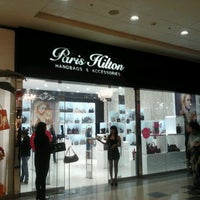 Photo taken at Paris Hilton Store: Handbags &amp;amp; Accessories by Erick S. on 9/29/2012