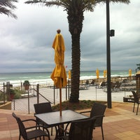 Photo taken at Barefoots Beachside Bar &amp;amp; Grill by Heather R. on 5/1/2013