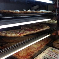 Photo taken at Justino&amp;#39;s Pizzeria by frosty on 11/17/2012