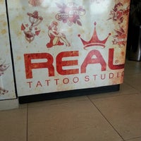 Photo taken at Real Tattoo by Robson A. on 9/22/2012