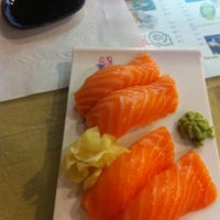 Photo taken at Sushi Kura by Liza G. on 9/23/2012