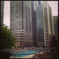 Photo taken at One Superior Place Pool Deck (One W Superior) by Greg D. on 7/31/2013