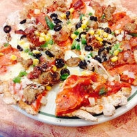 Снимок сделан в Maggie&amp;#39;s Pizza &amp;amp; Restaurant пользователем Jon S. 1/30/2014