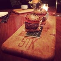 Photo taken at STK Steakhouse Midtown NYC by Alex S. on 3/3/2014