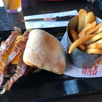 Photo taken at Red Robin Gourmet Burgers and Brews by Ricky C. on 4/26/2018