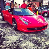 Photo taken at Maserati/Ferrari of Houston by Rishi C. on 1/8/2013