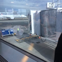 Photo taken at Gate C12 by Phil C. on 12/21/2015