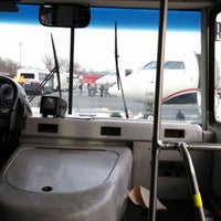 Photo taken at Shuttle Bus between C&amp;D Gates by Amelia on 12/24/2012