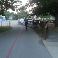 Photo taken at Monon Trail at Broad Ripple Apartments by Michael &amp;. on 8/12/2013