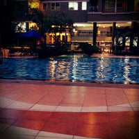 Photo taken at Poolside Tower A - Sudirman Park Apartment by Jensen L. on 4/14/2013