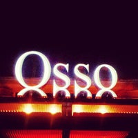 Photo taken at Osso Restaurant and Lounge by Chris L. on 7/22/2013
