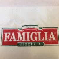 Photo taken at Famous Famiglia Pizza by Giovani P. on 8/9/2015