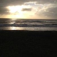 Photo taken at Praia do Ervino by Carlos P. on 1/12/2013