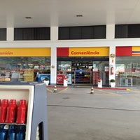 Photo taken at Posto Guaramirim (Pérola) by Carlos P. on 12/23/2012