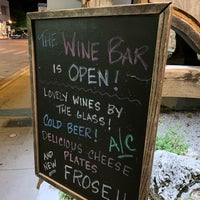 Photo taken at Grand Vin Wine Shop &amp;amp; Bar by Joel S. on 5/26/2019