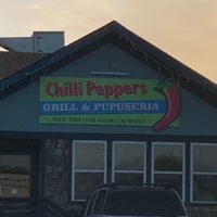 Photo taken at Chilli Peppers Coastal Grill by Debbi O. on 3/21/2021