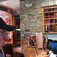 Photo taken at Red Robin Gourmet Burgers and Brews by Robin M. on 8/11/2019