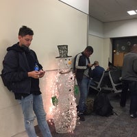 Photo taken at Gate T12 by Brian C. on 1/2/2017