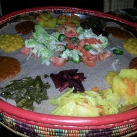 Photo taken at Abyssinia Ethiopian Restaurant by Reggie C. on 8/11/2013