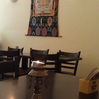Photo taken at OM Restaurant by Kapuzen A. on 10/26/2012