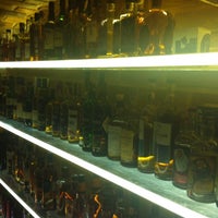 Photo taken at Klaipėda Whisky Club &amp; Shop by Dmitrij N. on 1/5/2013