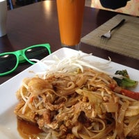 Photo taken at Sweet Basil Thai Cuisine by Mango C. on 12/11/2012