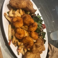 Photo taken at California Fish Grill by Regina W. on 5/1/2019