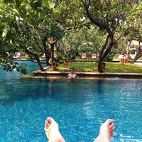 Photo taken at Poolside The Dharmawangsa Hotel by Ady L. on 10/6/2012