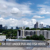 Photo taken at Six Feet Under Pub &amp;amp; Fish House by Richard J. on 7/21/2021