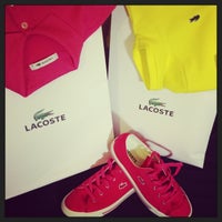Photo taken at Lacoste by Mari M. on 5/8/2013